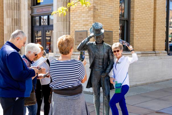 group touring the city of presidents statues found in downtown rapid city, sd