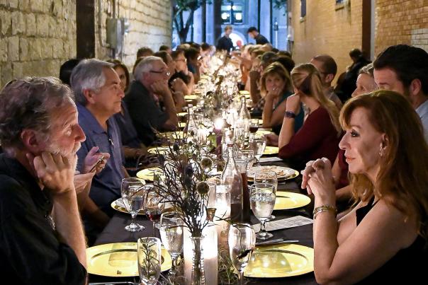 Group dining in outdoor urban setting