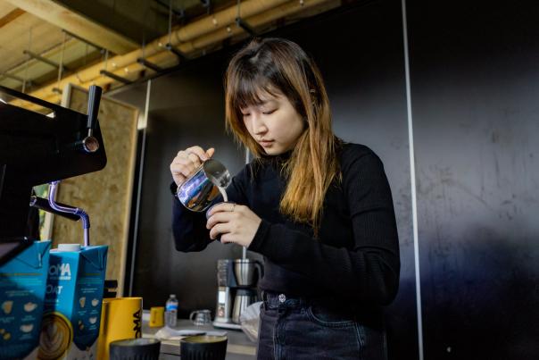 Woman pouring coffee