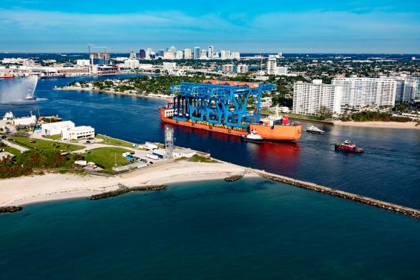 Three new container gantry cranes arrive to ceremonial tug spray at Port Everglades