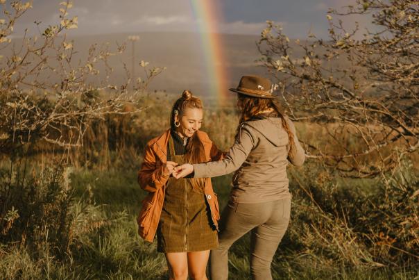 Women Dancing with Rainbow