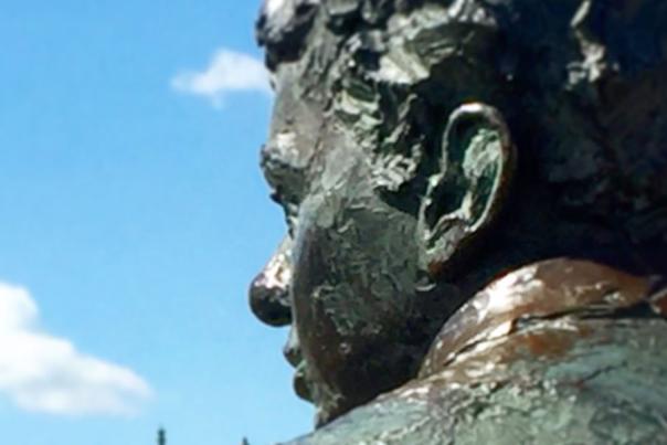 A close up of Dylan Thomas Statue