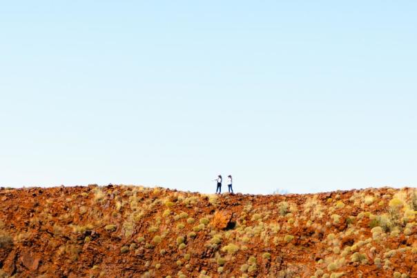 people_standing_at_the_top_of_hickman_crate_near_newman_in_the_pilbara._image_shire_of_east_pilbara