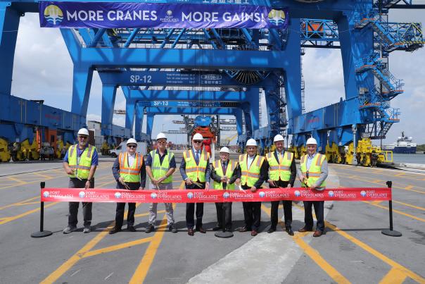 Port Everglades officials, partners and elected officials celebrate three new Super Post-Panamax container gantry cranes going into service during a ribbon-cutting ceremony..