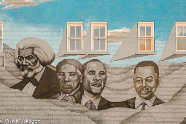 mural depicting Frederick Douglass, Harriet Tubman, Barack Obama and local muskegon leader Charles Waugh