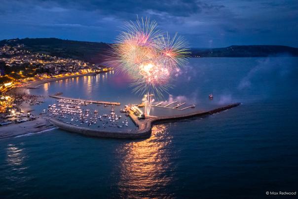 Fireworks over The Cobb harbour in Lyme Regis in Dorset
