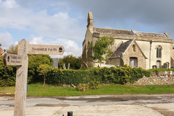 Image of a historic church with pale stone walls.