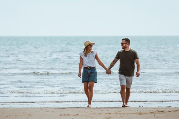 Couple walking on an east yorkshire beach