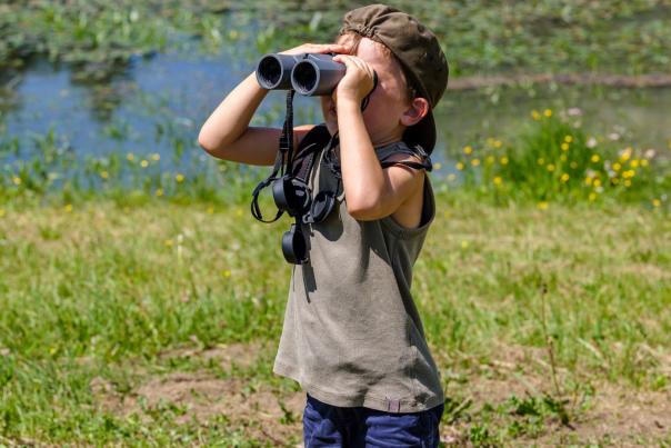 child with binoculars