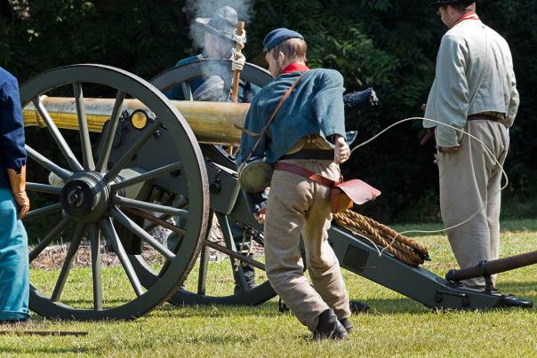 Civil War Reenactors firing a canon at Bentonville Battlefield in Four Oaks, NC