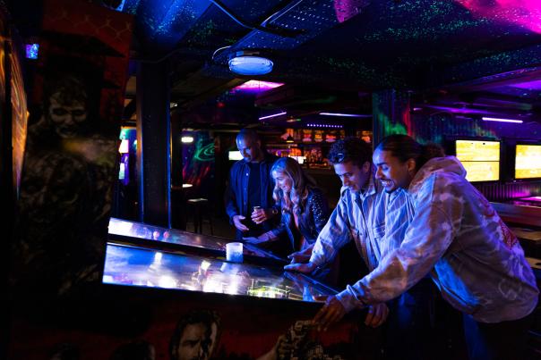 Couple playing arcade game in NQ64