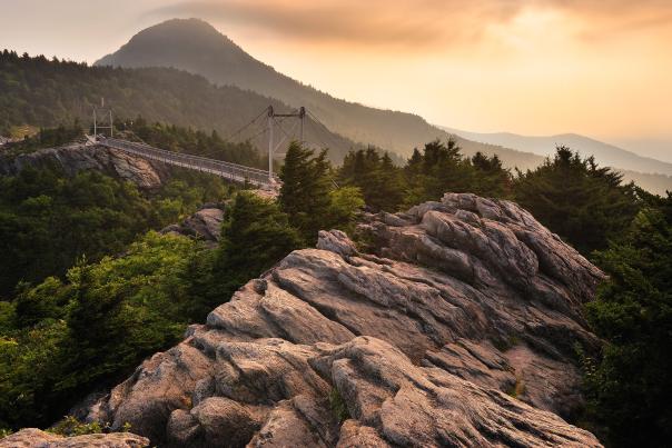Grandfather Mountain's famous Mile High Swinging Bridge at sunrise.