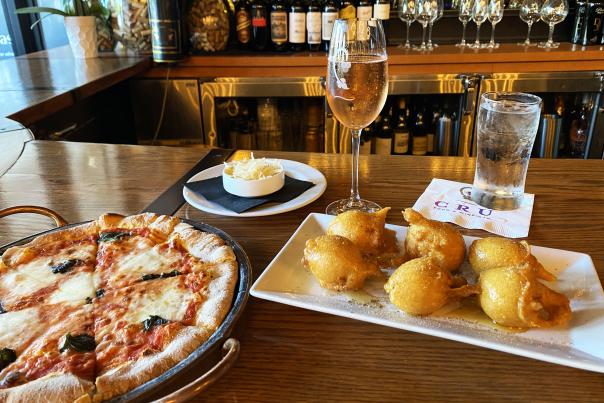 Happy Hour at CRU - Pizza and Goat Cheese Beignets