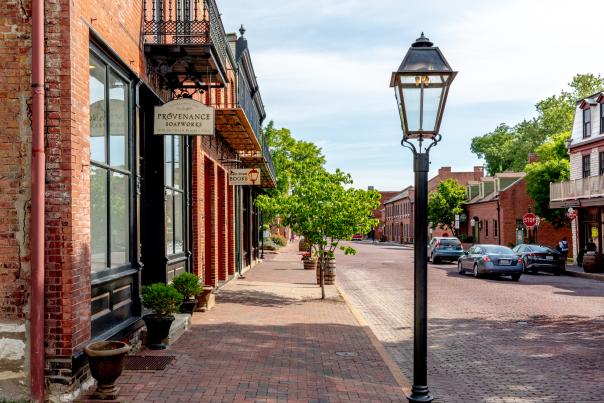 The road, sidewalks, and buildings are all made of brick in Historic Main Street in St. Charles, MO