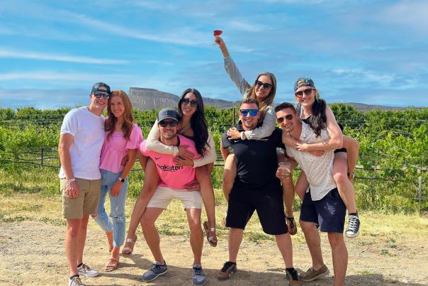 a group of people sipping wine and hanging out
