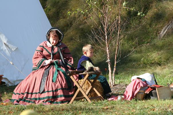 woman and boy dressed in period pieces