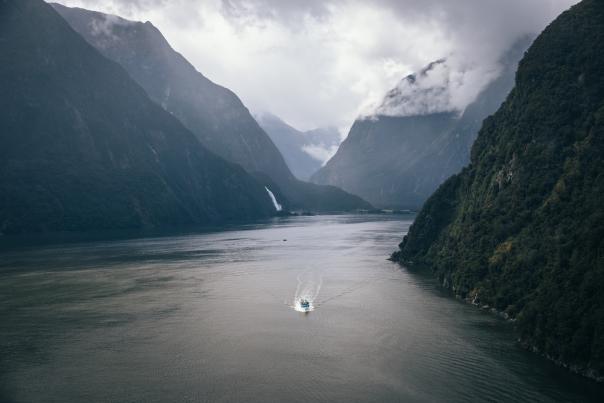 Aerial Photo of a Cruise Boat in Milford Sound