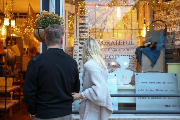 Couple window shopping in Downtown Frederick