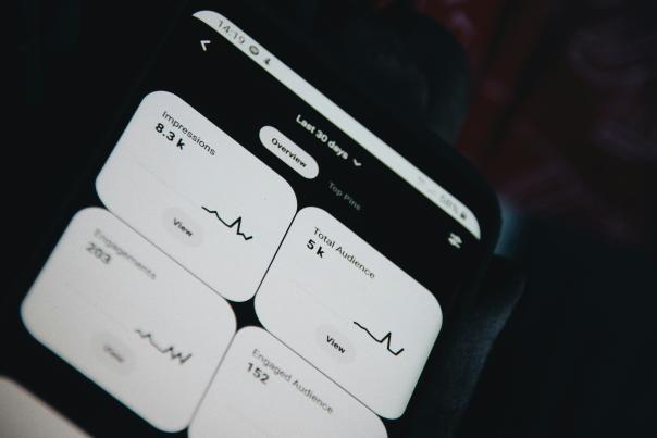 a phone screen with social media statistics on the screen