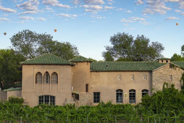 Balloons float above the beautiful grounds of Casa Rondeña Winery, in Los Rancho de Albuquerque.