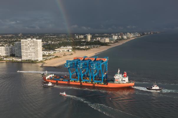 Cargo ship carries three Super-Post Panamax container gantry cranes in Port Everglades.