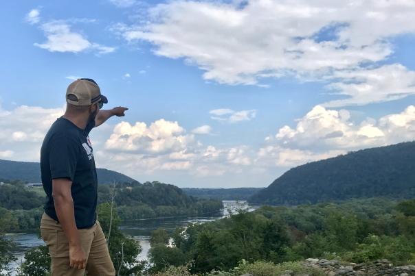 DJ Roche of DC101 looks out over the panoramic view at Harpers Ferry Brewing