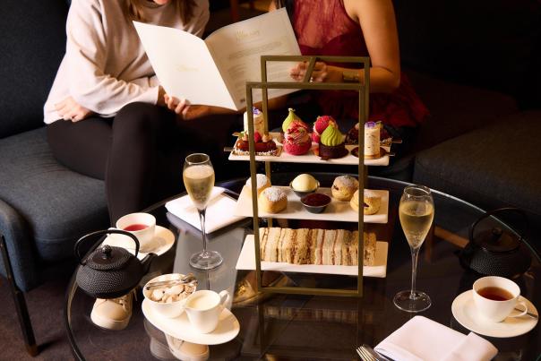 a selection of cakes and fizz