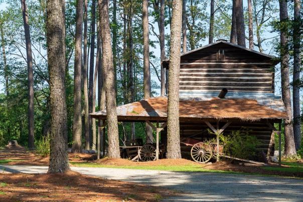 Iredell Brown Farmstead house and tobacco barn at Tobacco Farm Life Museum in Kenly, NC.