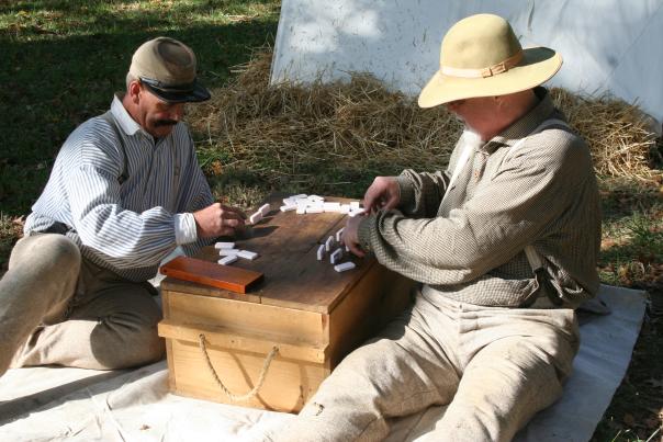 Civil War-era soldiers playing dominoes