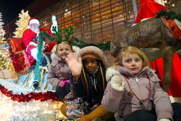 Children on a parade float with Santa during the Dayton Holiday Festival Children's Parade