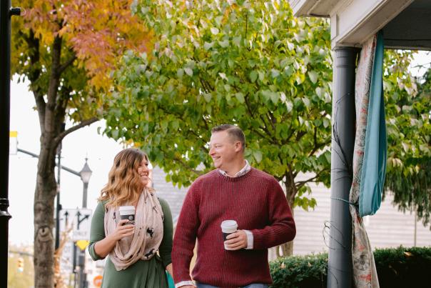 A couple enjoying coffee while strolling Historic Dublin streets in the fall