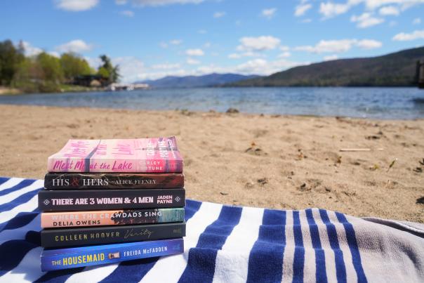 Stack of books on a towel at Shepard Park