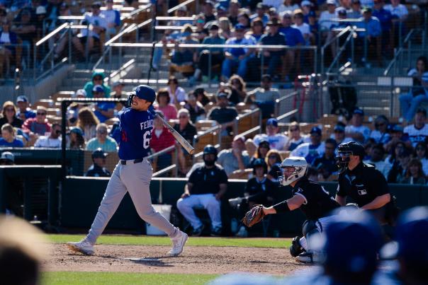 Baseball player swinging a bat