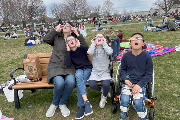 Family viewing eclipse at Onondaga Lake Park