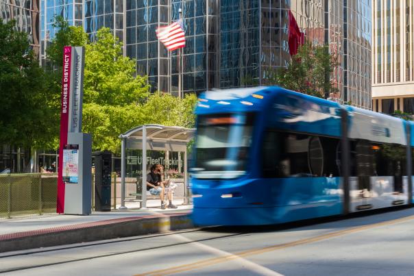 Blue OKC Streetcar approaching Business District route stop in downtown Oklahoma City