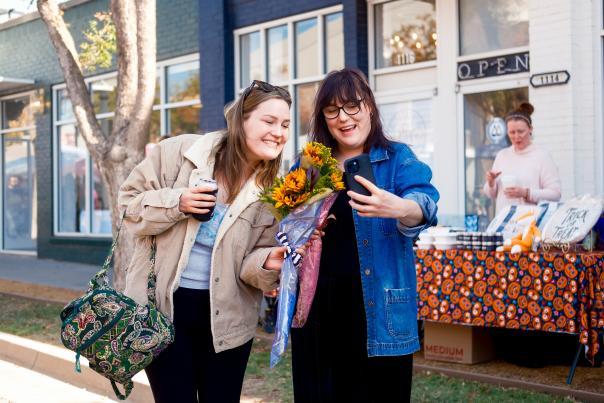 Two women taking a selfie at Oklahoma City's Midtown Walkabout