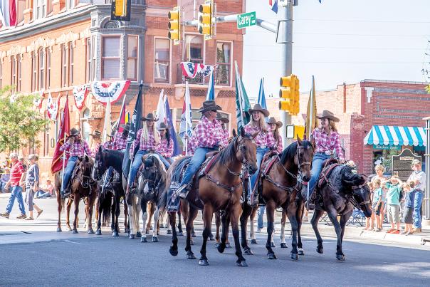The Dandies march in the Frontier Days Parade