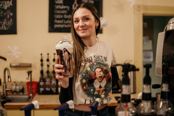 Woman with drink at Sugar Bowl