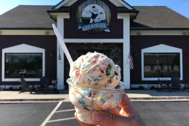Ice cream with crushed peanuts and colorful M&M pieces