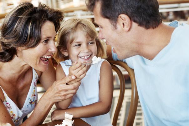 Family eating dessert at a restaurant