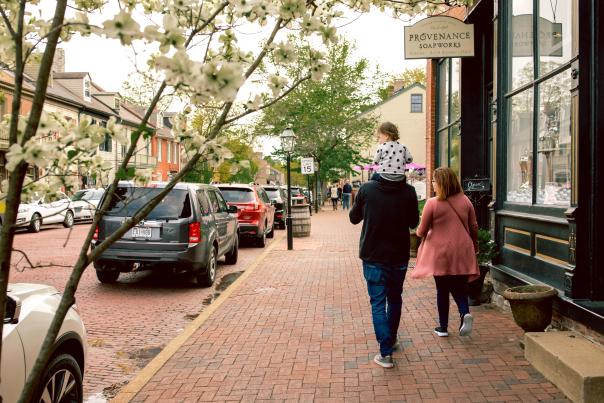 Small family strolling down Main Street St. Charles