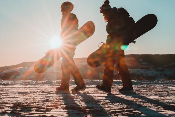 Two snowboarders at Hogadon Basin on Casper Mountain shot by David Kerr