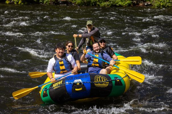 A group whitewater rafting with Adirondack Adventure Center