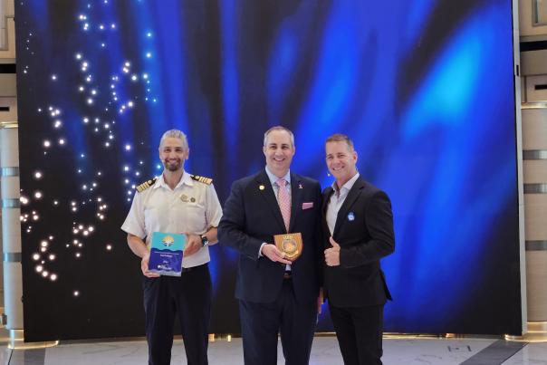 Port Everglades CEO and Port Director presents plaque to Princess Cruises' president and ship captain.