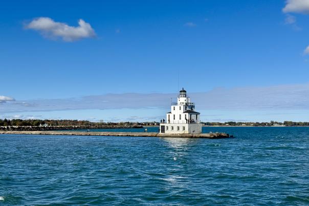 Manitowoc Breakwater Lighthouse to right blue water fall day