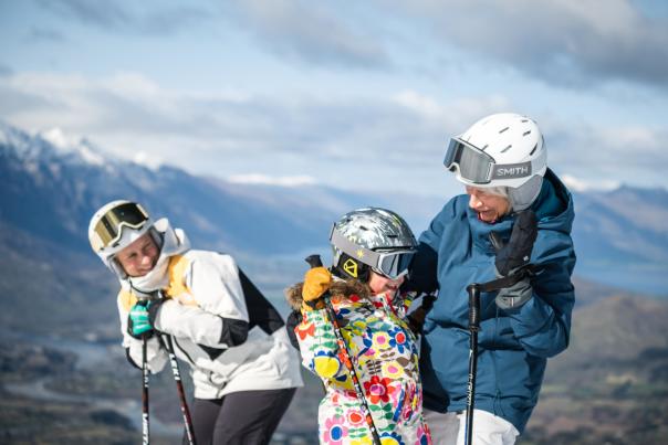 Family skiing at Coronet Peak