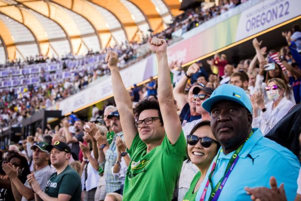 Joyful fans in stadium stands