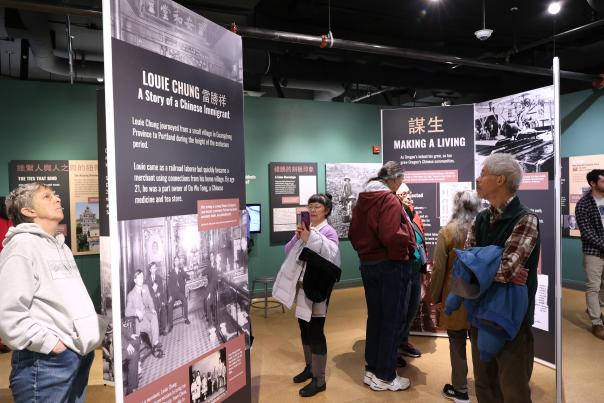People look at the Chinese Oregon exhibit.