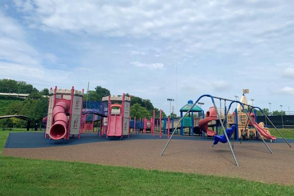 Playground equipment sits ready and waiting for children to visit at a Knoxville park.