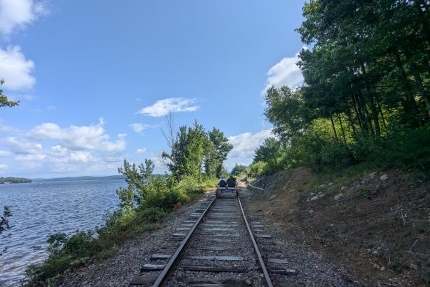 Granite State Rail Bikes - Lake View with Train Tracks and Rail Bike